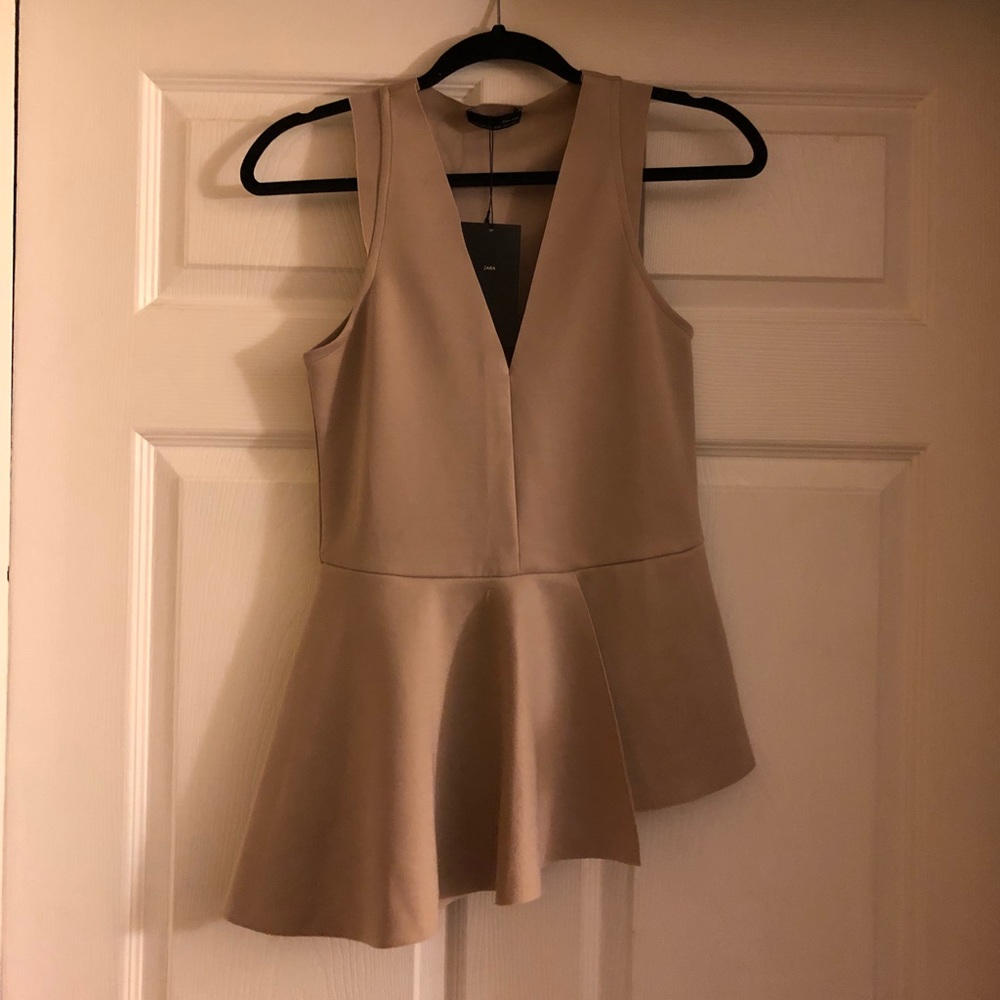 Asymmetrical peplum shirt